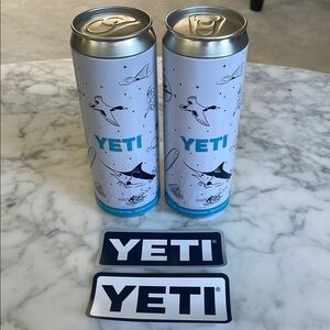 2 Yeti Blue and Silver Fish-Themed slim cans with 2 stickers